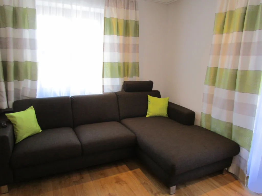 Appartement Schneeberg: Wohnbereich mit Ecksofa